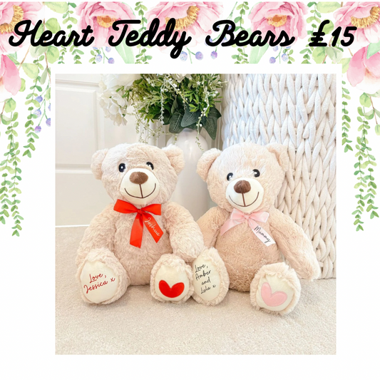 Teddy bear with ribbon and heart patch